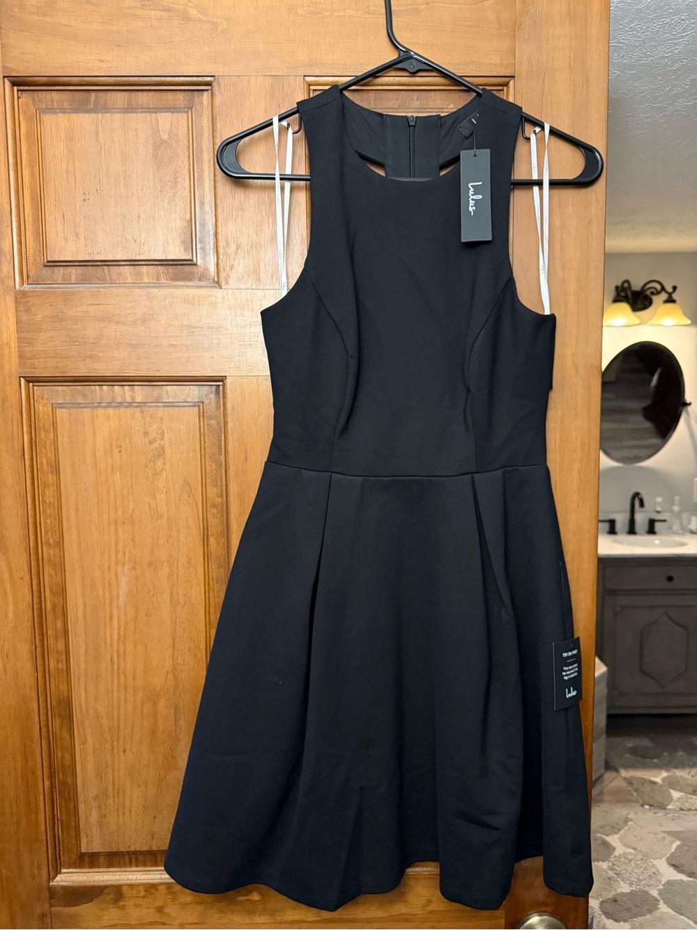 Lulu's Black Sleeveless A-Line Mini Dress